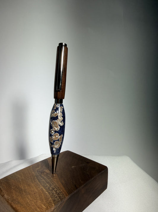 Dark Roast pen — coffee beans in resin with black walnut cap, on walnut stand