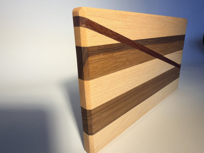 Short Cuts board standing view showing walnut and maple bands