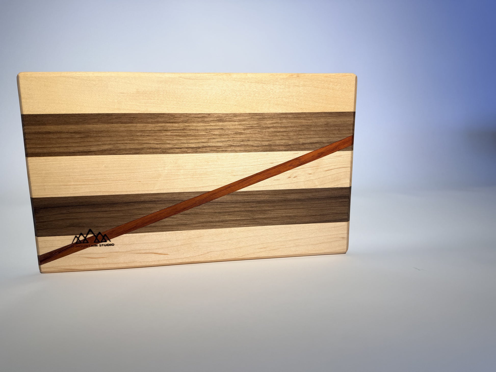 Short Cuts board top view with diagonal padauk line