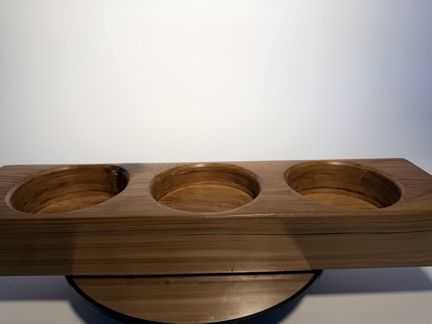 Douglas fir candle holder showing aged grain and wax paste luster