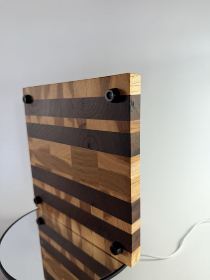 End-grain walnut and oak striped board — back with rubber feet