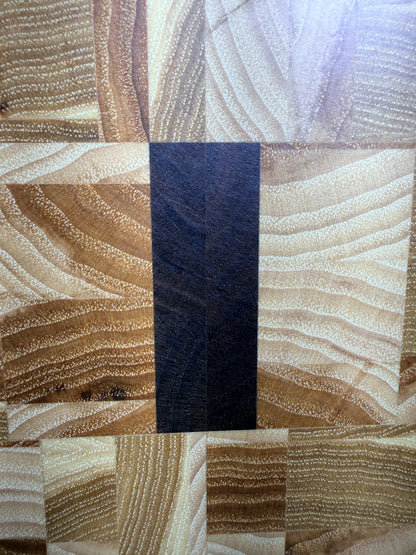 End-grain mosaic with walnut accent — grain macro close-up