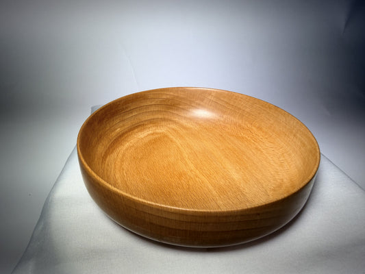 Circles in Time maple bowl, three-quarter view